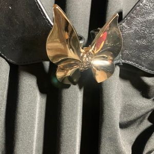 Women’s decorative belt butterfly clasp. Stretchy material. Great condition.
